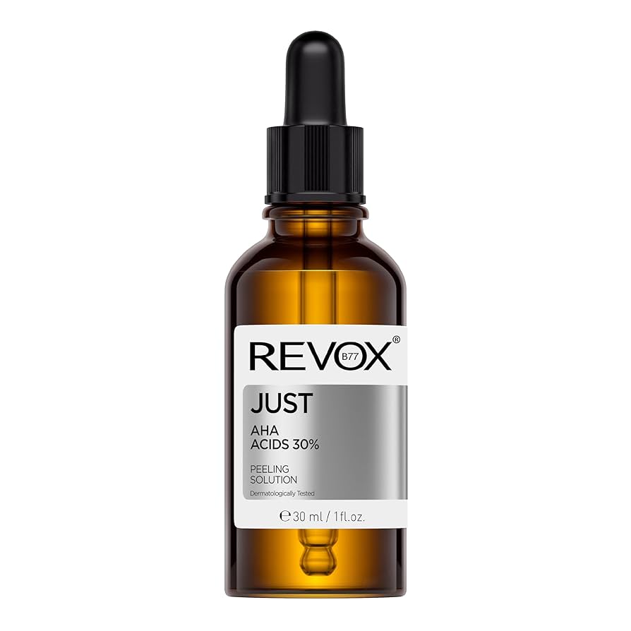 Brown Revox skincare serum bottle with dropper on a white background