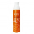 Avene sunscreen spray bottle on a white background