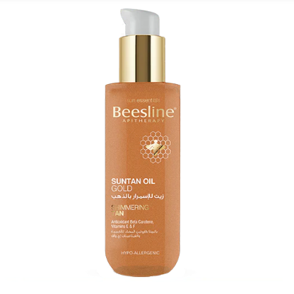 Beesline Suntan Oil Gold bottle on a white background