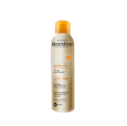 Beesline sunless tanning oil spray bottle on a white background