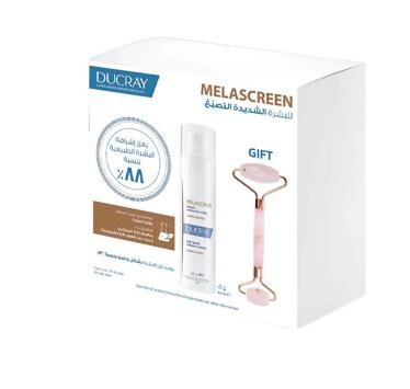 Ducray Melascreen skincare product set with roller and packaging on a white background