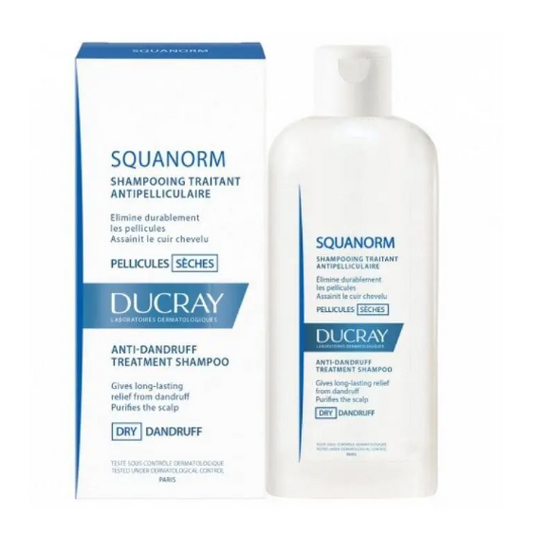 Ducray Squanorm anti-dandruff treatment shampoo and packaging on a white background