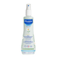 Mustela hair and skin freshener bottle on a white background