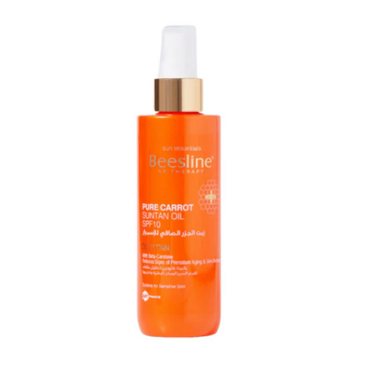 Orange bottle of Beesline Pure Carrot Sun Tan Oil with white cap on a white background