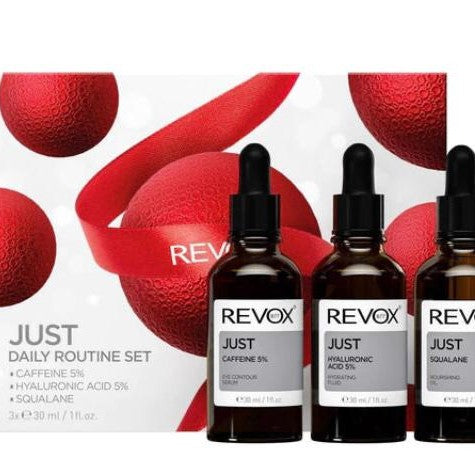 REVOX skincare routine set with bottles and packaging on a white background