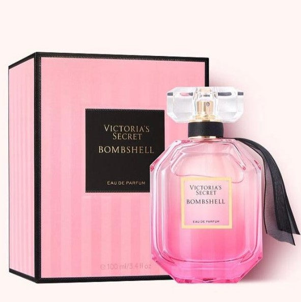 Victoria's Secret Bombshell perfume bottle and packaging on a white background