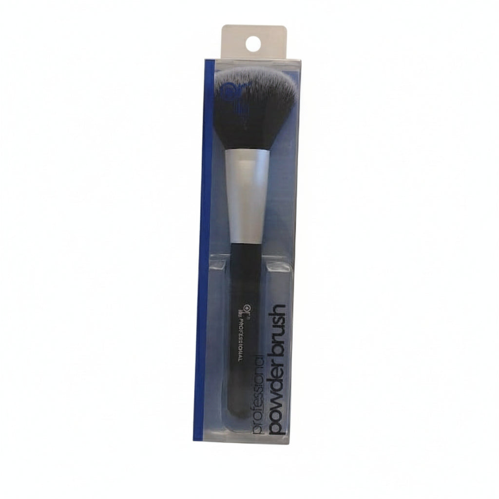 Powder brush in packaging on a beige background