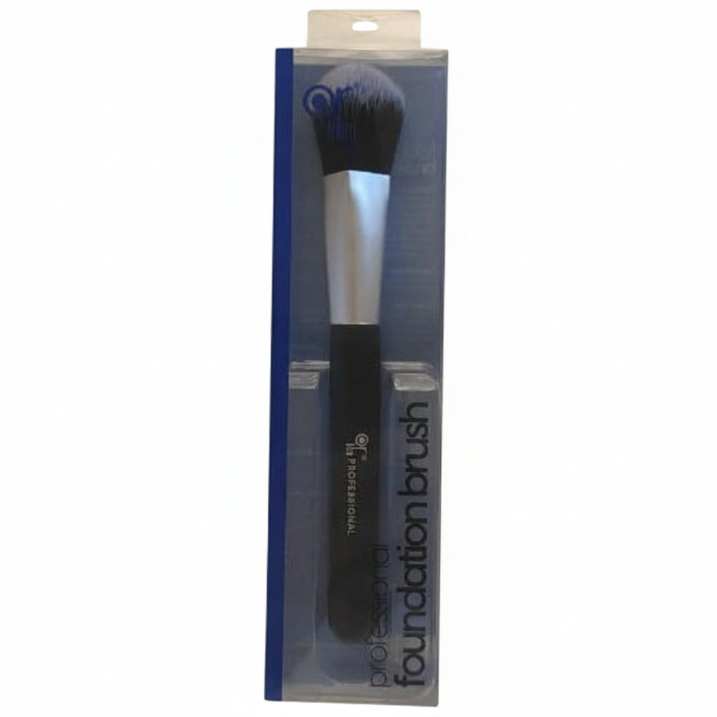 Foundation brush in packaging on a beige background